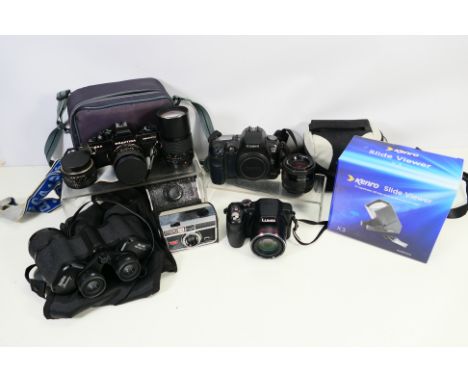 Photography - A collection of cameras and accessories to include Praktica BCA, Canon EOS D60 and other, also a pair of Halina