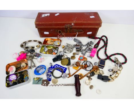  A box of mixed items to include a variety of police and military buttons, made of metal and black bakelite plastic, keys, a 