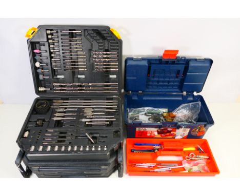 Lot to include a tool bit set and a toolbox containing sockets and other. [2]. [W]