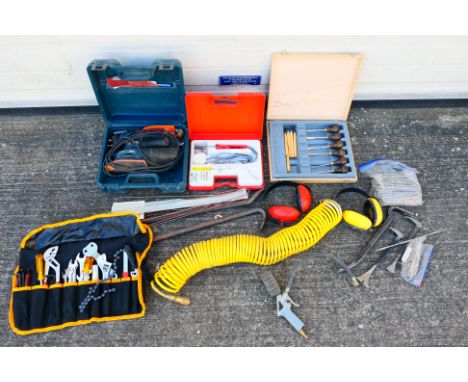 Lot to include a Black & Decker sander, crowbars, ear defenders and similar. [W]