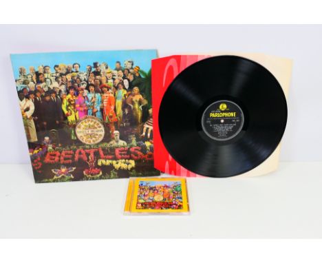 The Beatles, Sgt Pepper's Lonely Hearts Club Band, mono PMC 7027, psychedelic inner, no cut outs, and a Children In Need DVD.