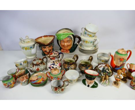 A mixed lot of ceramics to include Japanese tea wares, Royal Doulton character jugs, Goebel Hummel figures and similar. [W]

