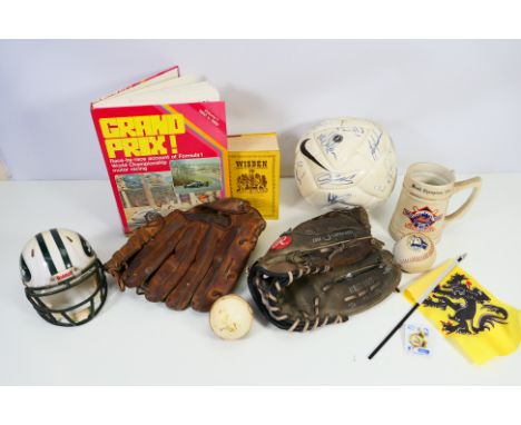 Sporting Memorabilia, A large box of items to include vintage baseball gloves, mini American
football helmet, baseball memora