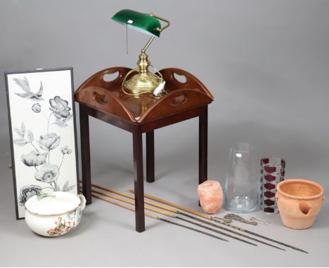 A reproduction mahogany square butler’s tray in a stand base, 47cm wide x 61cm high; together with a brass desk lamp; a flora