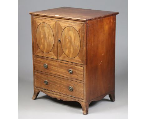 A 19th century inlaid-mahogany commode with a hinged lift-lid above a mock-drawer panel front, &amp; on ogee bracket feet, 67