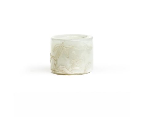A Chinese white jade 'bamboo and lingzhi' archer's ringQing dynasty, 18th centuryCarved in shallow relief with bamboo and lin