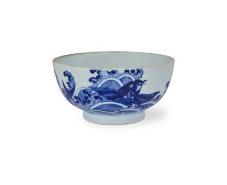 A Chinese Bleu de Hue 'winged carps' bowl for the Vietnamese marketQing dynasty, 19th centuryFinely painted around the body w