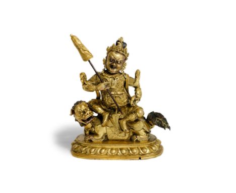 A Sino-Tibetan gilt copper-alloy figure of VaishravanaQing dynasty, 17th/18th centuryThe God of Wealth cast wearing a finely-