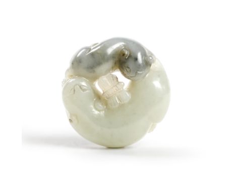A Chinese grey and celadon jade carving of two catsQing dynasty, 18th/19th centuryCarved in reticulation as two recumbent cat
