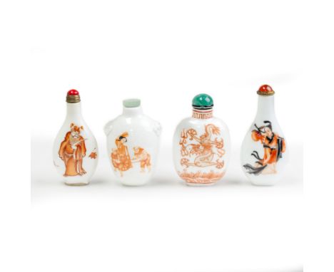 Four Chinese iron-red snuff bottlesLate Qing dynasty-20th centuryComprising: an iron-red and gilt bottle enamelled with drago