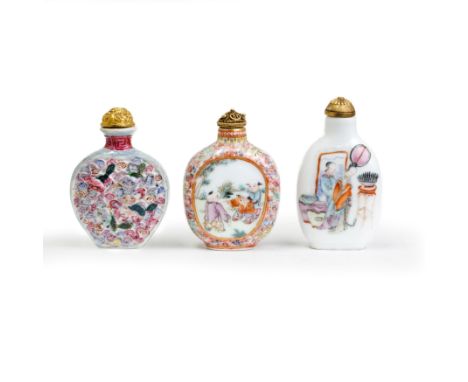 Three Chinese famille rose snuff bottlesLate Qing dynasty, apocryphal Qianlong seal marksOne decorated with medallions of boy