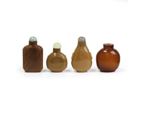 Three Chinese agate-imitation glass snuff bottle and one amber-imitation glass snuff bottleLate Qing dynastyThe first three o