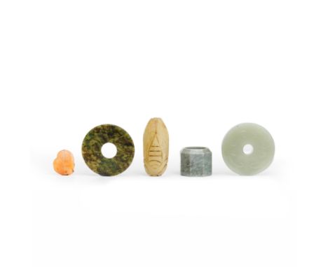 Five Chinese hardstone carvings19th - 20th centuryComprising a pale green jade bi carved to each side with four scroll motifs