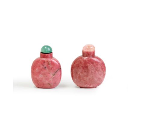 Two Chinese pink rhodonite snuff bottlesLate Qing dynastyBoth well-hollowed, the first standing on an oval, short, lipped foo