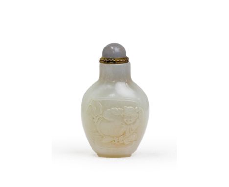 A Chinese white jade 'boy and peach' baluster snuff bottleQing dynasty, 18th centuryThe pale stone of a 'mutton-fat' hue, car