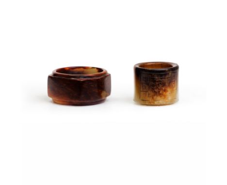A Chinese russet jade archer's ring and a congQing dynasty, 19th centuryThe archer's ring carved with a rectangle containing 