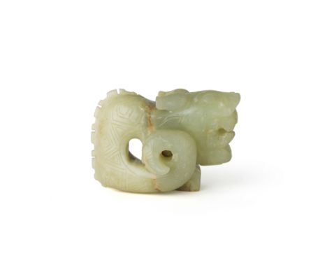 A Chinese archaistic jade carving of a tiger 20th centuryCarved with fierce expression, its curled tail flanking its body, th