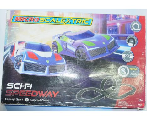 Micro Scalextric a boxed Sci-fi Speedway set (see photo). Condition appear to be Good (unchecked for completeness and unteste