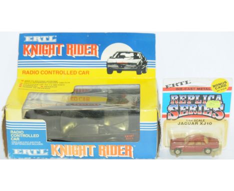 Ertl a boxed pair comprising of a Radio Controlled Knight Rider car and No.1915 1:64 Scale Jaguar XJ10. Conditions are genera