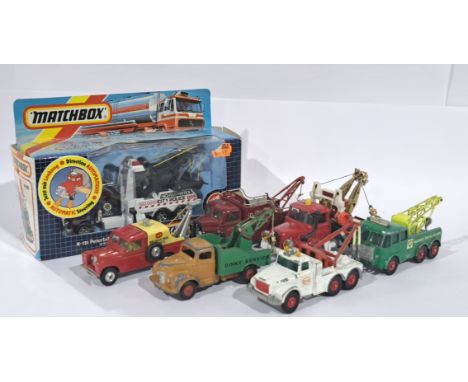 Corgi, Matchbox and similar. A pickup truck mixed group to include Corgi Land Rover 109", Dinky #430 Breakdown Truck and othe