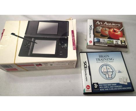 Nintendo DS Lite handled console, boxed with two games and power supply. P&amp;P Group 2 (£18+VAT for the first lot and £3+VA