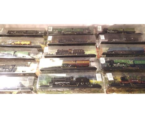 Fifteen cast resin OO scale model locomotives, static on plinths. Mostly in packets, in excellent condition, magazine issue. 