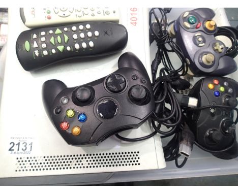 Microsoft Xbox 360 games console, lacking power supply, with mixed aftermarket controllers and accessories. P&amp;P Group 3 (
