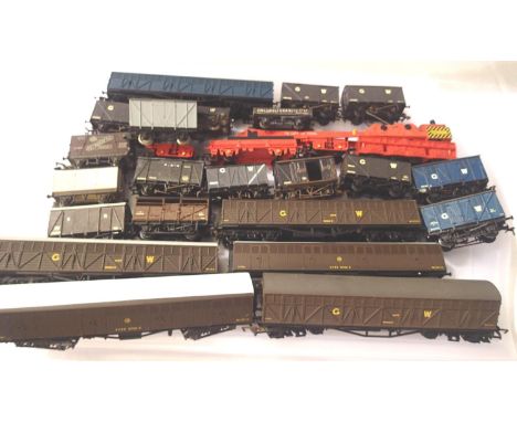 Twenty three OO scale wagons, various makes including kit built, mostly good condition, all unboxed. P&amp;P Group 1 (£14+VAT