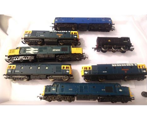 Seven OO scale Diesel locomotives, mostly BR Blue Livery. Includes various types suitable for spares or refurbishment. P&amp;