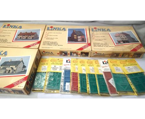 Four Linka OO scale plaster moulding sets, sealed country inn, stone terrace, brick terrace, village shops. Plus ten mould pa