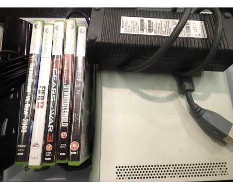 Microsoft Xbox 360 games console with power supply, Kinect, AV Connection and five games. P&amp;P Group 3 (£25+VAT for the fi