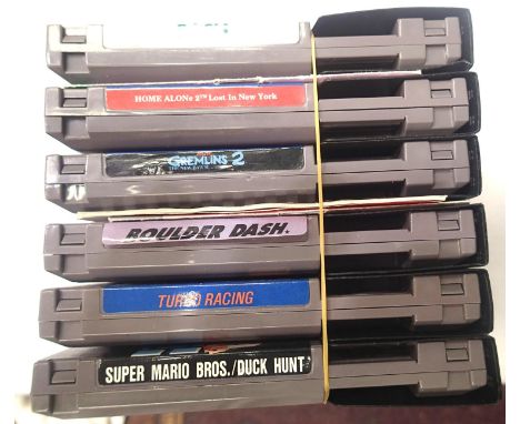 Six Nintendo Nes game cartridges, Home Alone 2, Gremlins 2, Boulder Dash, Turbo racing, Duck Hunt and Goal. P&amp;P Group 1 (