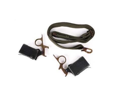 A Sterling sub machine gun sling; a Sten magazine loading tool; also a Vigneron sub machine gun magazine loading tool. All VG
