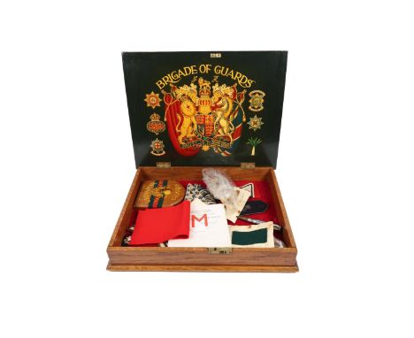An oak box, 20" x 16" x 3½", the interior of lid beautifully painted with Royal Arms and badges of The Household Division. Th
