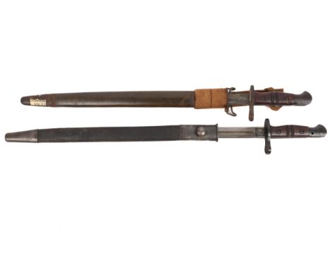 A P17 bayonet in a 1907 pattern scabbard, GC; another in its scabbard, badly pitted. (2) £80-100
