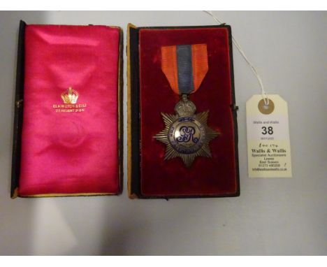Imperial Service Medal, George V first type star shaped award, reverse named John A Truscott. G VF in  its Elkington case (AF