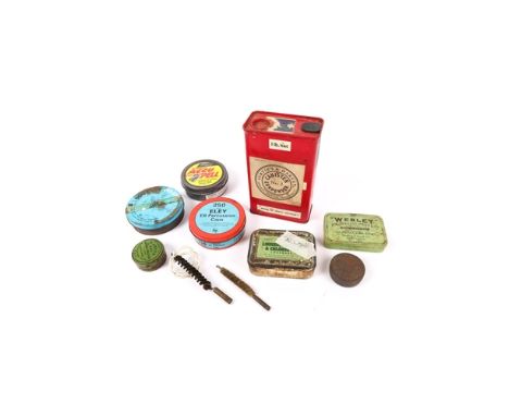 A 1lb canister for Curtiss &amp; Harvey No 2 gunpowder, red with paper labels; a green Webley pellet tin for ".177 Special Pe