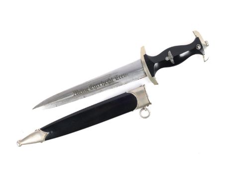 A good Third Reich SS mans dagger, blade etched "Meine Ehre Heist Treue" and "Ed Gembruch Solingen", black handle with white 