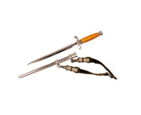 A Third Reich Army officer's dagger, with unmarked blade, the hilt with silver plated mounts, the cross guard retaining trace