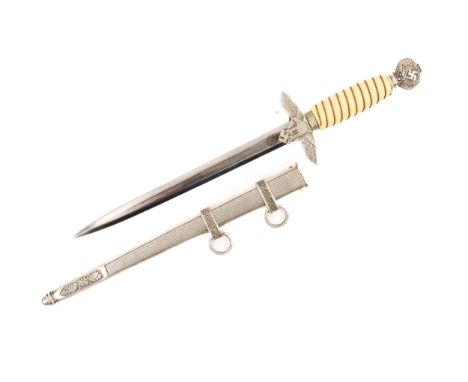 A good Third Reich Luftwaffe 2nd pattern officer's dagger, blade marked "Paul Weyersberg Berlin", white ivorine grip, alloy m