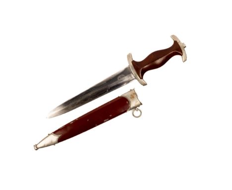 A Third Reich SA dagger, by E Bonsmann, Solingen, nickel silver mounts, the crossguard marked "Nm" (SA Group Nordmark), in it