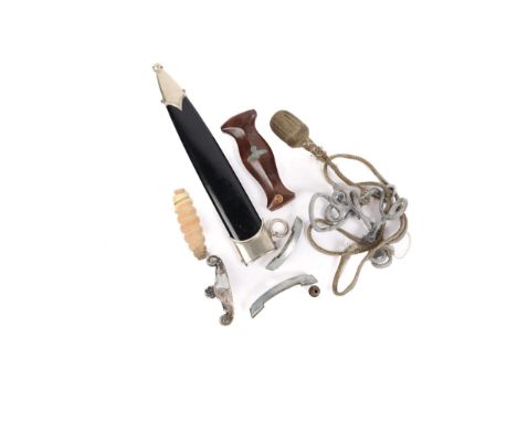 A Third Reich SS man's dagger scabbard; an S.A. wood bagger grip and other parts. GC £200-225