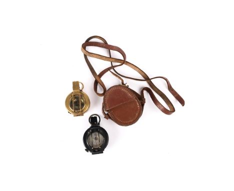 A blackened brass military prismatic marching compass, the base marked "M.D.S. Ltd London" and "Pat.Appd For", GC (the glass 