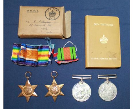 Collection of WWII medals awarded to R. Atkinson including 1939 - 45 Star, France and Germany Star, War Medal 1939 - 45, Defe