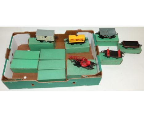 Three Hornby boxed O gauge lumber wagons, 8 other boxed Hornby O gauge rolling stock including crane truck, tank wagon, low s