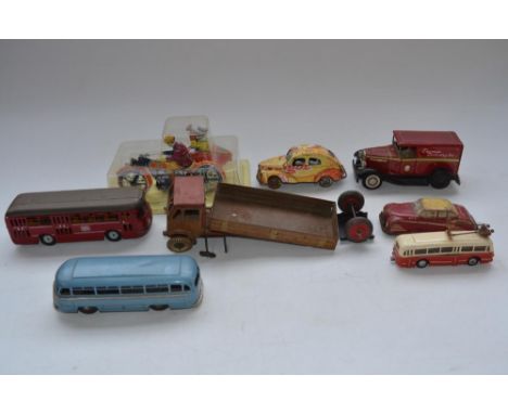 Collection of modern and vintage tinplate bus, motorbike and car models, all A/F. (8) 