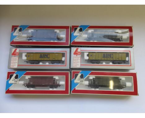Two Lima OO gauge ARC twin bogey open wagons no. 305670A2, 2 Lima OO gauge twin bogey hopper wagons no. 305666W, 2 other hopp