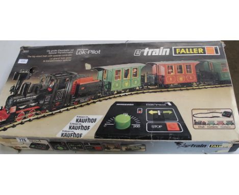 Two Faller O gauge train sets to include E-train set 3810, 0-6-0 steam engine, 3 passenger carriages, track and controller an