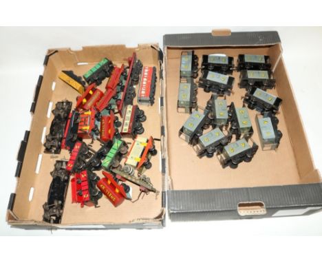Chad valley tin plate 0 gauge mixed rolling stock including Shell, BP tanker wagons, open wagons, twin bogey flat breads and 