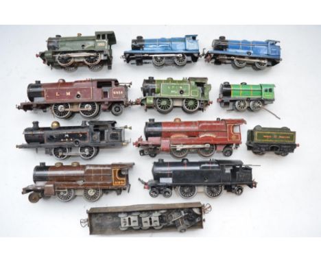 Collection of vintage O gauge clockwork train models from Hornby and Chad Valley for spares and repairs 
